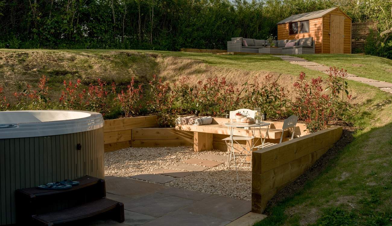 Enjoy an al fresco snack by the hot tub. 