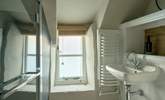 The chic shower-room has been cleverly designed to accommodate the history of the building.  - Thumbnail Image