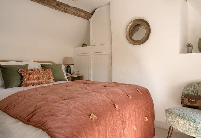 Contemporary and stylish furnishings marry well with the historic beams. 