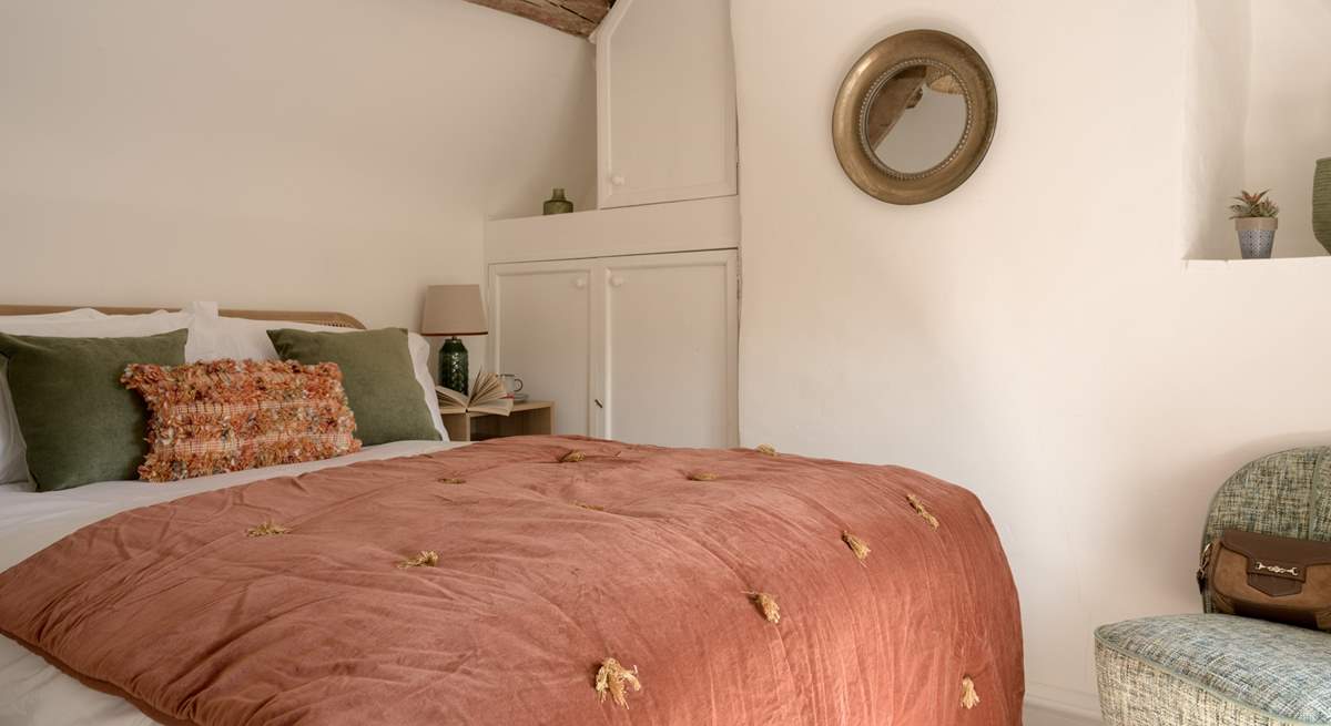 Contemporary and stylish furnishings marry well with the historic beams. 