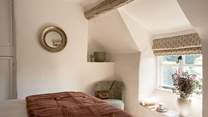 Sit awhile and enjoy a cup of tea, the bedroom looks over the garden. 