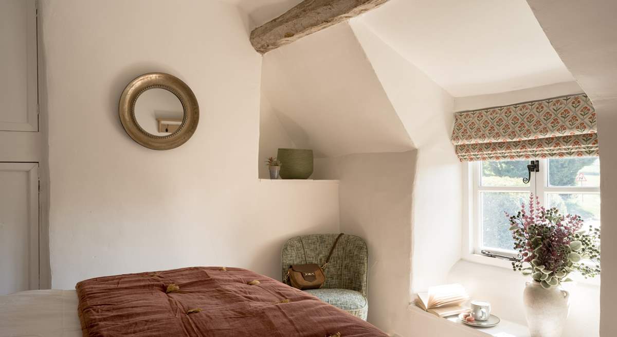 Sit awhile and enjoy a cup of tea, the bedroom looks over the garden. 