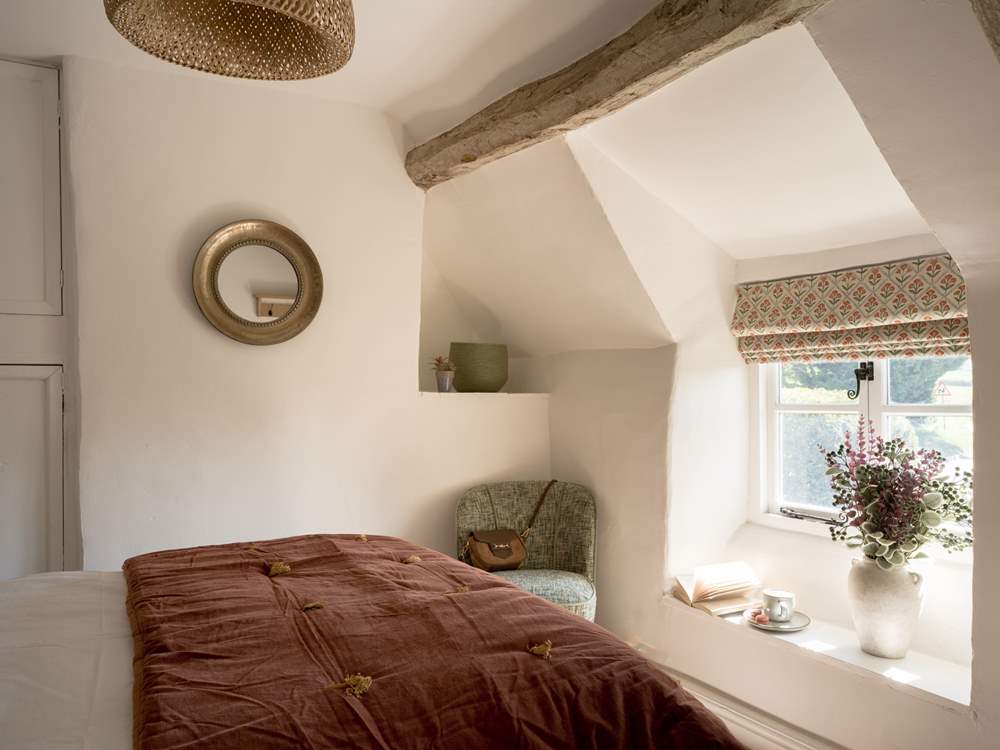 Sit awhile and enjoy a cup of tea, the bedroom looks over the garden.