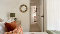 This double bedroom is decorated in relaxing shades. 