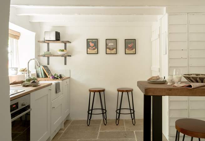 Lovely stone floors grace this kitchen. 