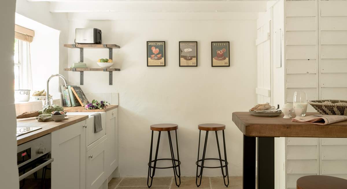 Lovely stone floors grace this kitchen. 