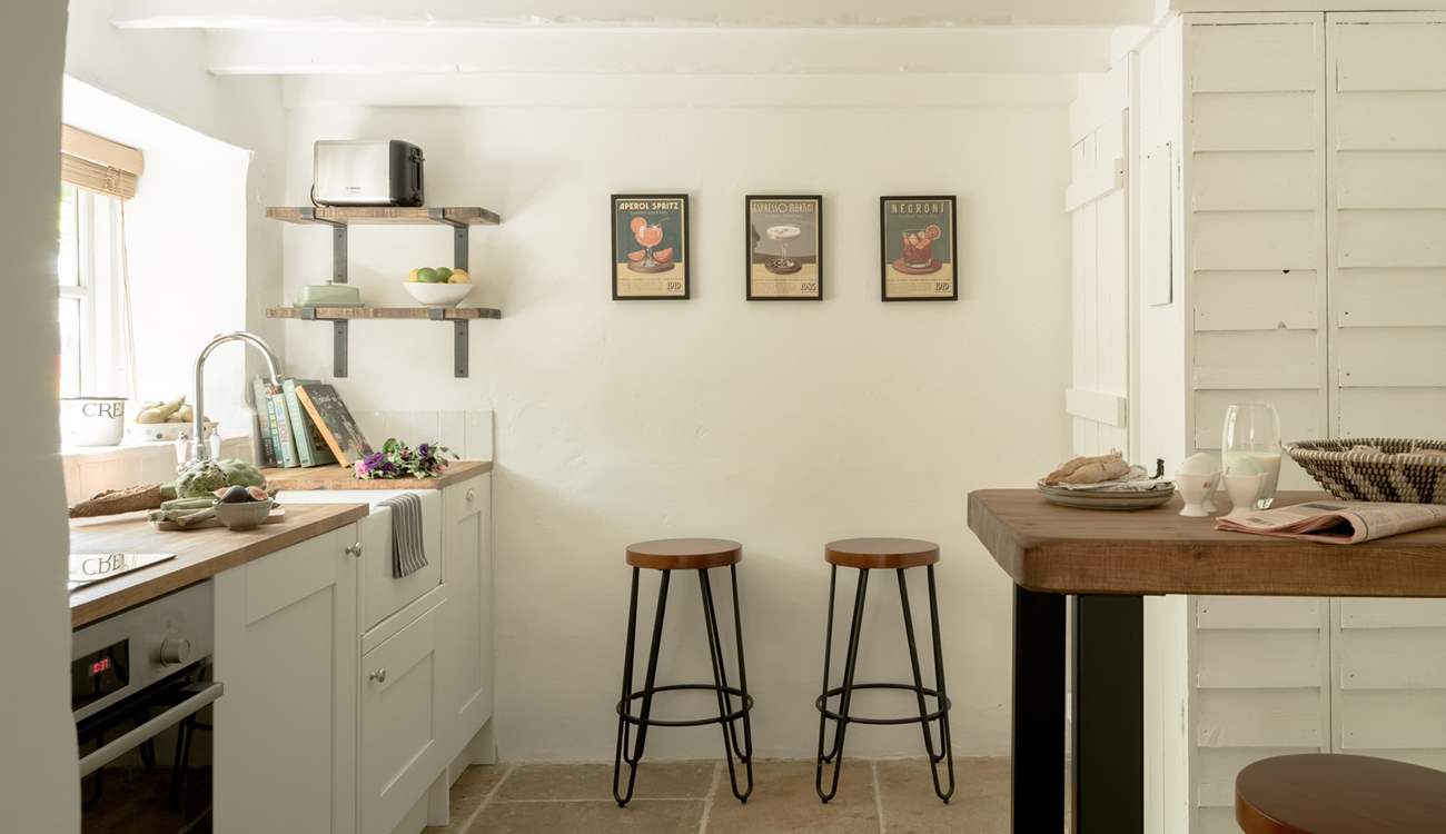 Lovely stone floors grace this kitchen. 