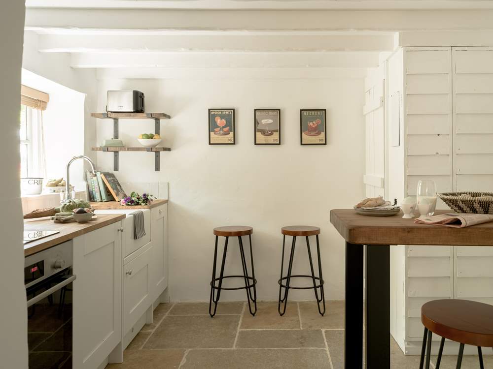 Lovely stone floors grace this kitchen.