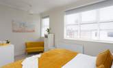 Enjoy a restful night's sleep on the comfy bed. - Thumbnail Image