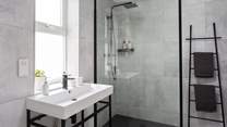 With a modern and stylish shower-room.