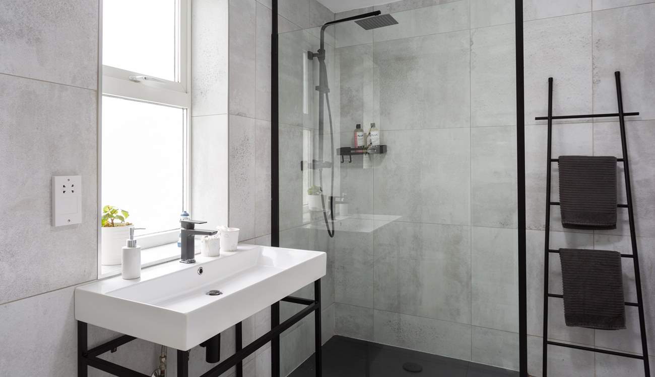 With a modern and stylish shower-room.