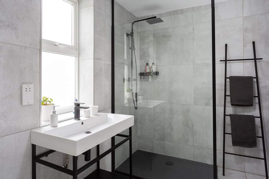 With a modern stylish shower-room.