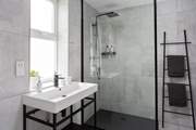 With a modern stylish shower-room.