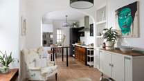The large kitchen has a sitting-area for those who don't cook!