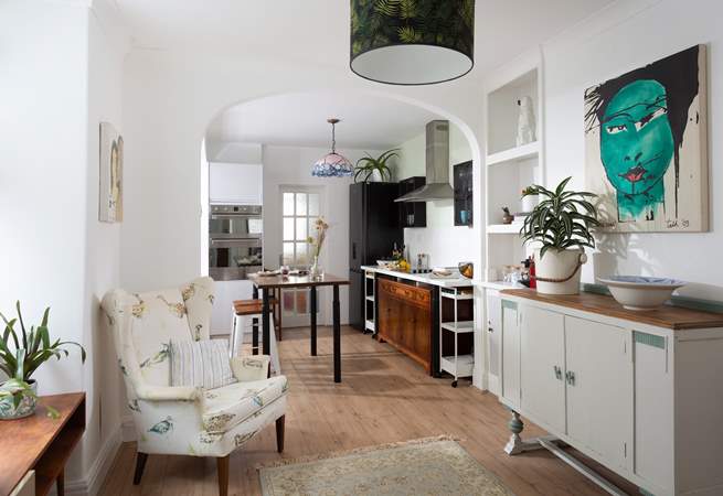 The large kitchen has a sitting-area for those who don't cook!