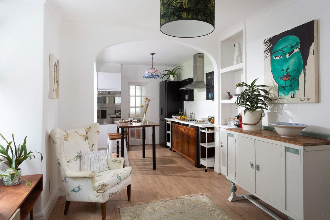 The large kitchen has a sitting-area for those who don't cook!