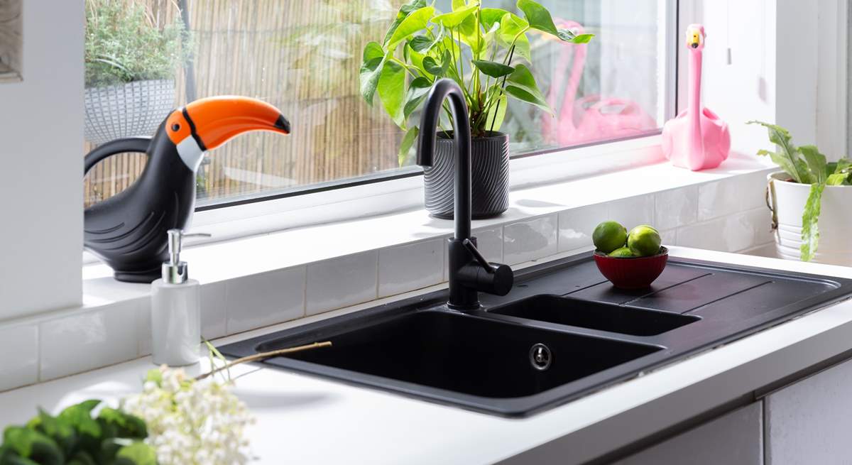 The well-equipped kitchen awaits you.