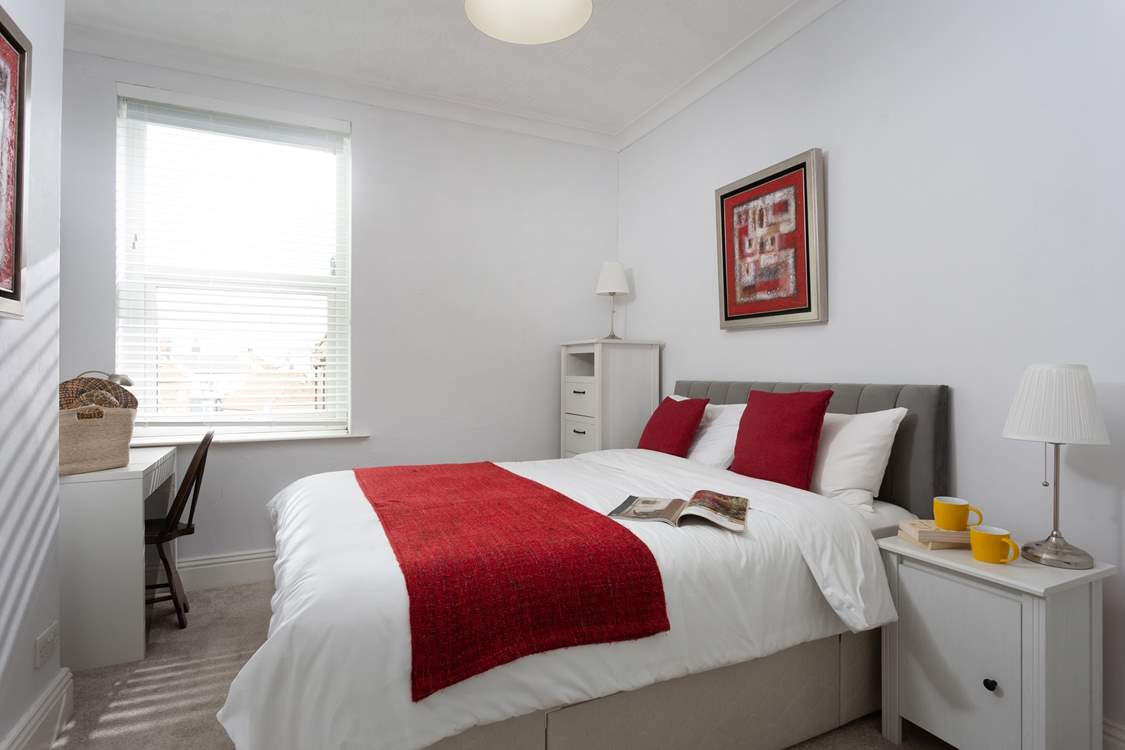 The second bedroom is equally delightful.