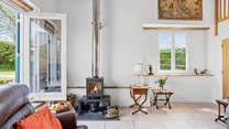 The glowing wood-burner is the perfect addition for those chillier evenings.