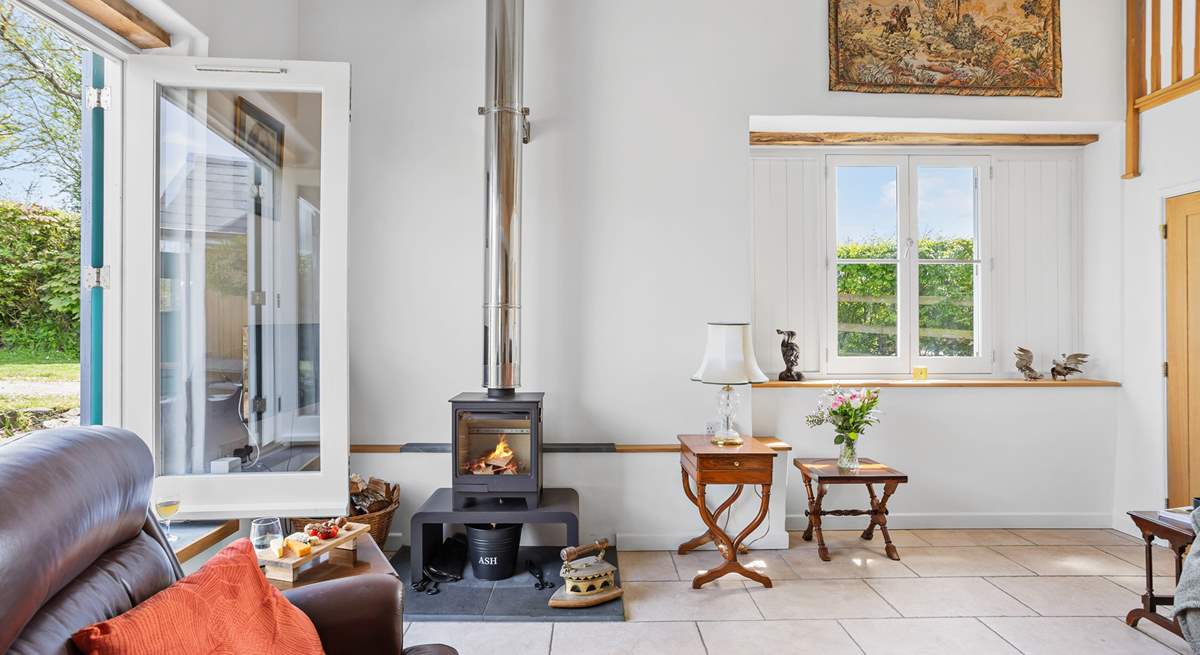 The glowing wood-burner is the perfect addition for those chillier evenings.
