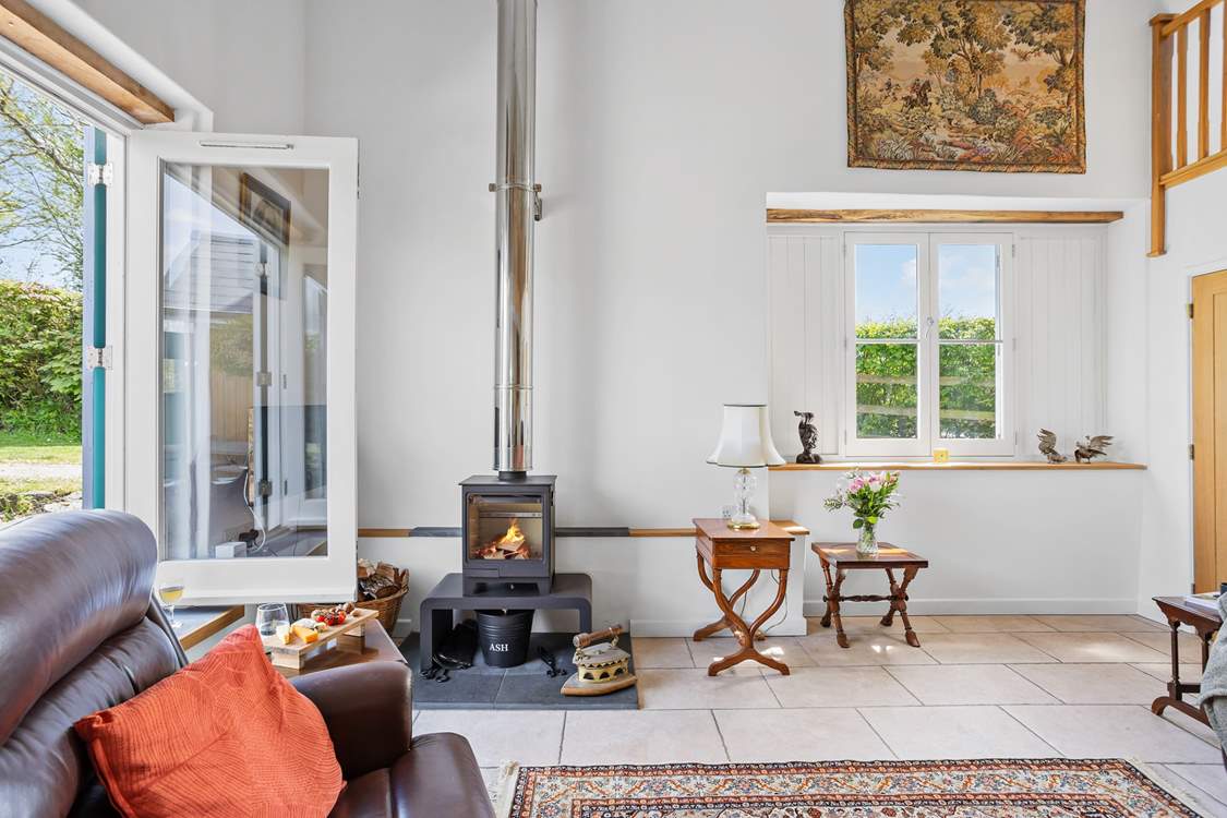 The glowing wood-burner is the perfect addition for those chillier evenings.
