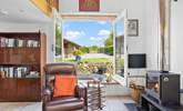 Fling open the huge windows and enjoy the feel of being outside, from the comfort of the sitting-room. - Thumbnail Image