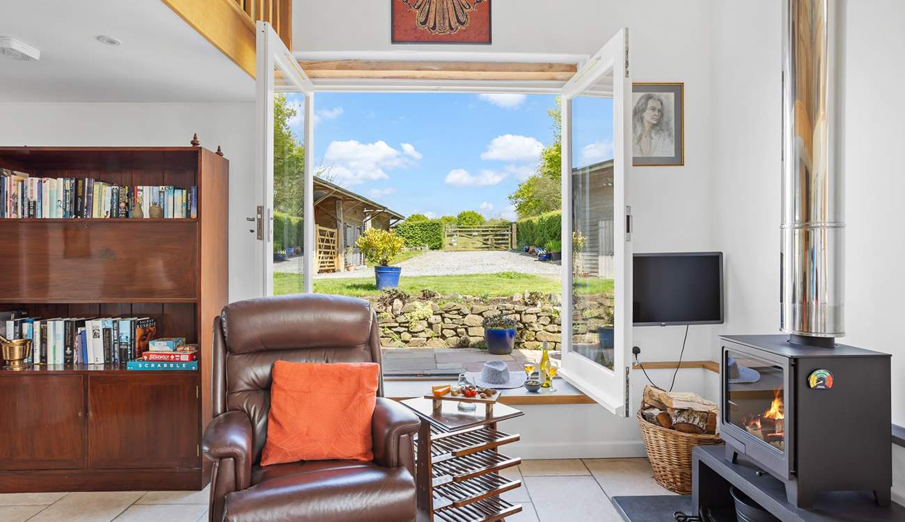 Fling open the huge windows and enjoy the feel of being outside, from the comfort of the sitting-room.