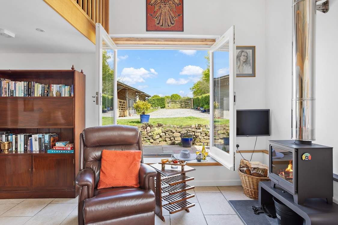 Fling open the huge windows and enjoy the feel of being outside, from the comfort of the sitting-room.