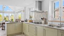 The beautiful kitchen is fully equipped with everything you will need to whip up any feast.