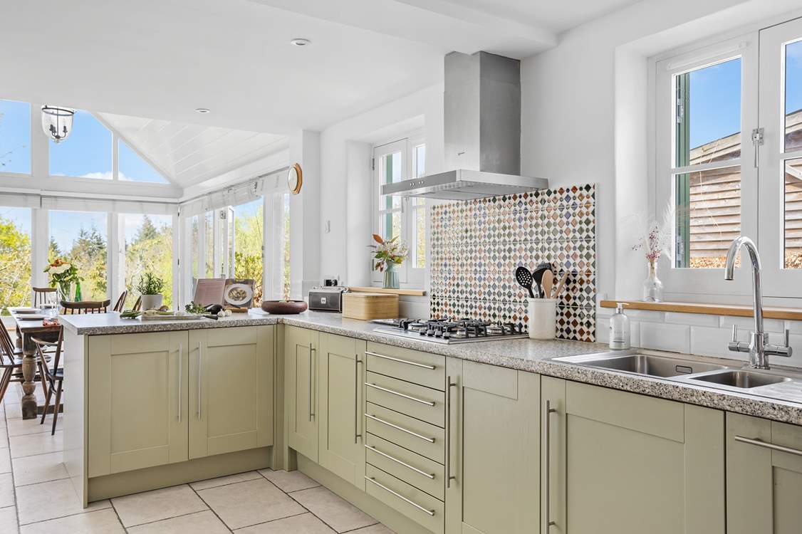 The beautiful kitchen is fully equipped with everything you will need to whip up any feast.