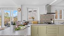 The kitchen offers oodles of worktop space.