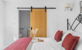 Bedroom 1 also has a shower-room cleverly tucked away behind a sliding door. - Thumbnail Image