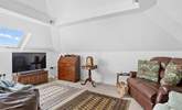 The second sitting-area is also super cosy, offering the perfect place to unwind in. - Thumbnail Image