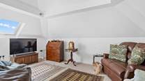 The second sitting-area is also super cosy, offering the perfect place to unwind in.