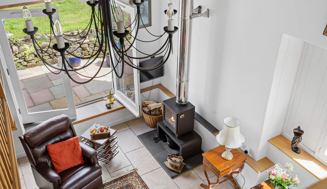 Looking down from the mezzanine level into the main ground floor sitting-room.