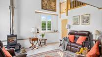 The sitting-room is a welcoming and cosy space. 