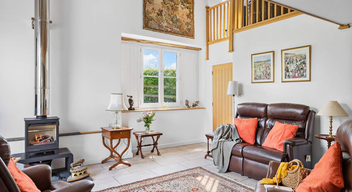 The sitting-room is a welcoming and cosy space. 