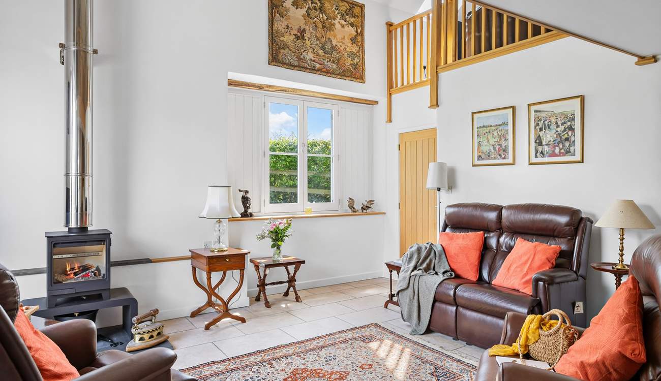 The sitting-room is a welcoming and cosy space. 