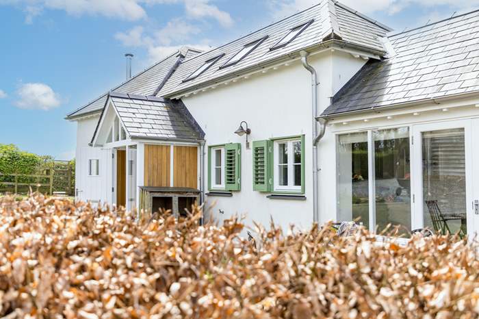Prestons Barn is a 2 bedroom, dog friendly holiday cottage near Crediton, North Devon.