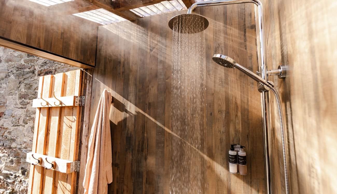 Enjoy a hot rainfall shower after a wild swim at your private beach. 