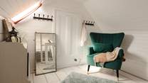 The bedroom is beautifully decorated. 