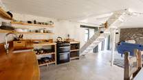 Open plan living allows your day to flow with ease. Take care on the staircase as there is no handrail. 