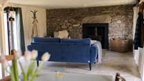 The cosy living space is the perfect spot to settle down with a good book. 