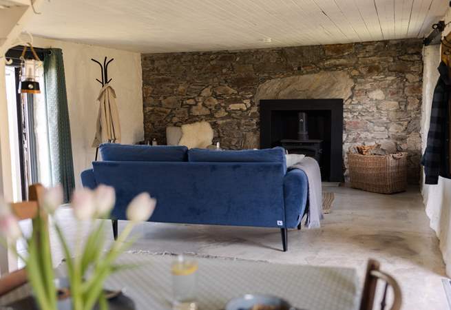 The cosy living space is the perfect spot to settle down with a good book. 