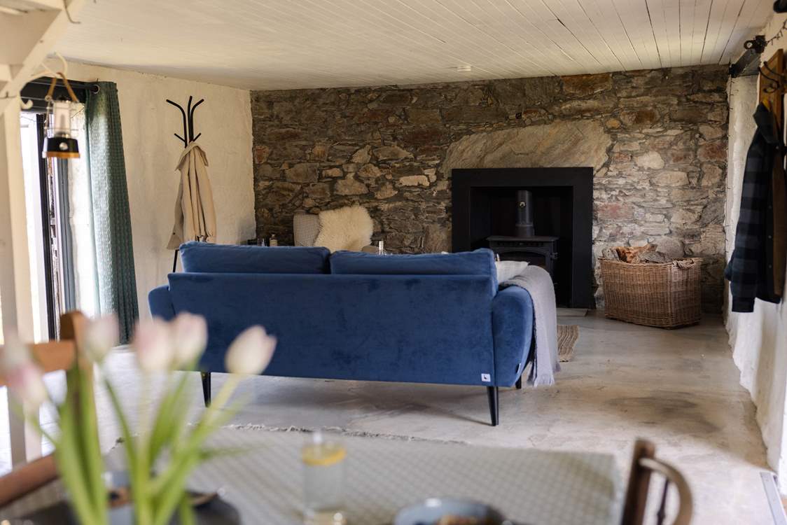 The cosy living space is the perfect spot to settle down with a good book.