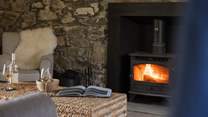 The wood-burner will warm your toes after a day of adventures. 