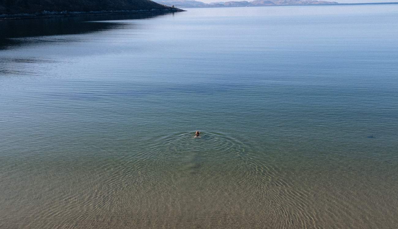 Or take a dip in the glassy water.