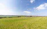 Although this cottage does not have a garden, it is surrounded by beautiful fields owned by the hosts. You are most welcome to pack a picnic and enjoy the sea views less than a minute's walk from the property.   - Thumbnail Image