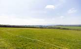 A field with a wonderful far-reaching view, perfect for a leisurely picnic or walking the dogs. - Thumbnail Image