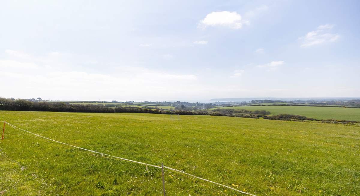 A field with a wonderful far-reaching view, perfect for a leisurely picnic or walking the dogs.